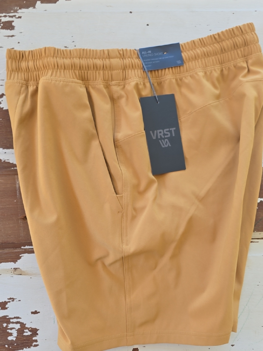 VRST All-In Unlined Shorts Mens Small Palomino Gold 7” Inseam Performance Stretc